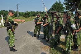 A Ukrainian army officer, left, gives instructions to his soldiers before conducting training in Yavoriv, Ukraine, July 10, 2013, during Rapid Trident 2013. Rapid Trident is an annual joint combined exercise involving the U.S. and Partnership for Peace member nations. Missions alternate in odd and even years. In odd years Rapid Trident is a field exercise, while in even years the exercise incorporates a command post exercise. 